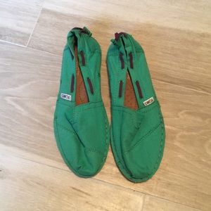 Brand new Toms.  Never used.